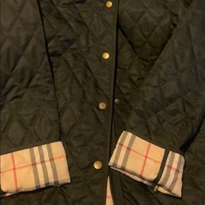 Burberry vintage jacket.  Size medium.  Black with tan plaid.
